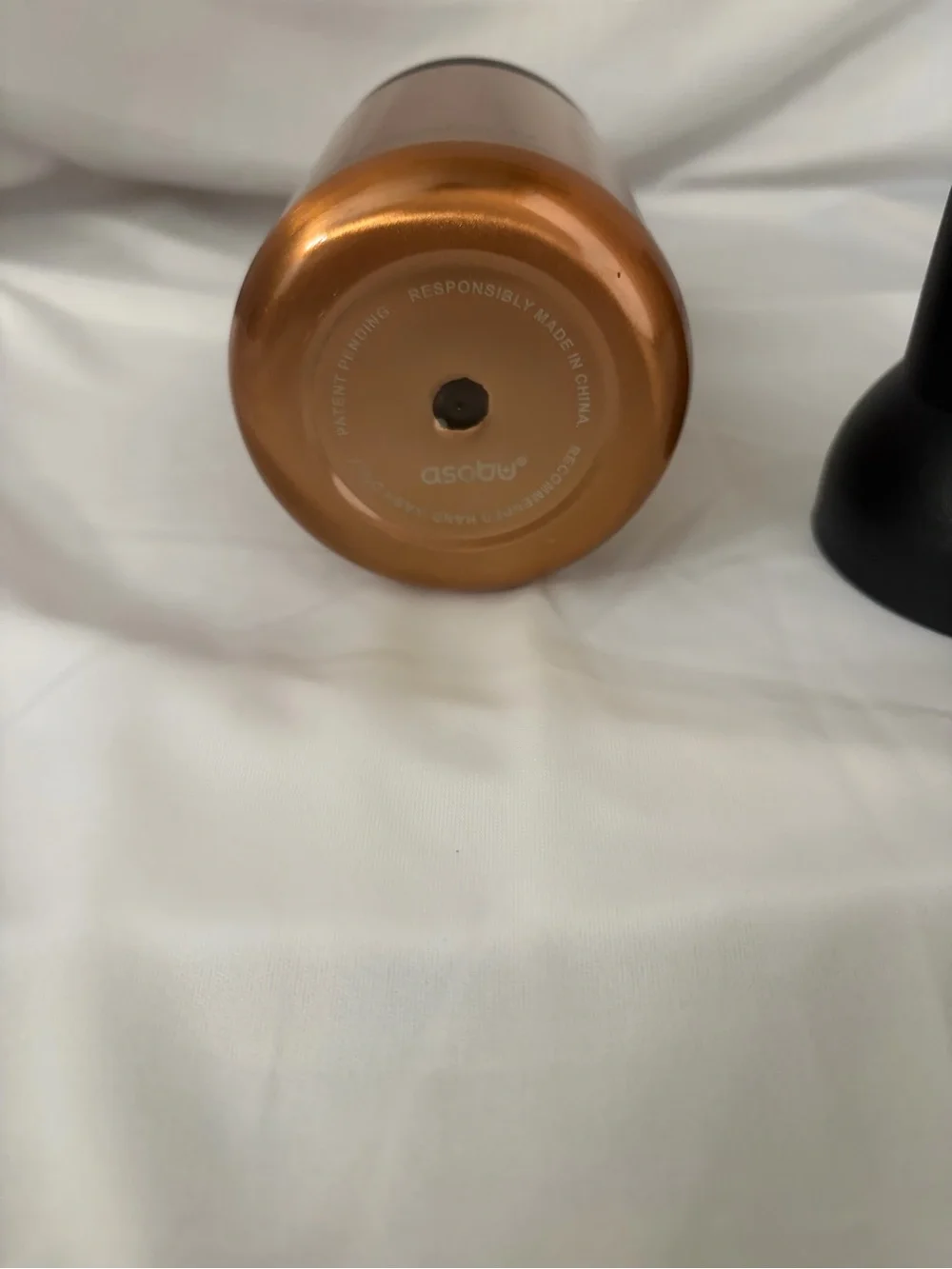 Asobu Insulated Bottle Cooler with Black Silicone Top and Copper Body